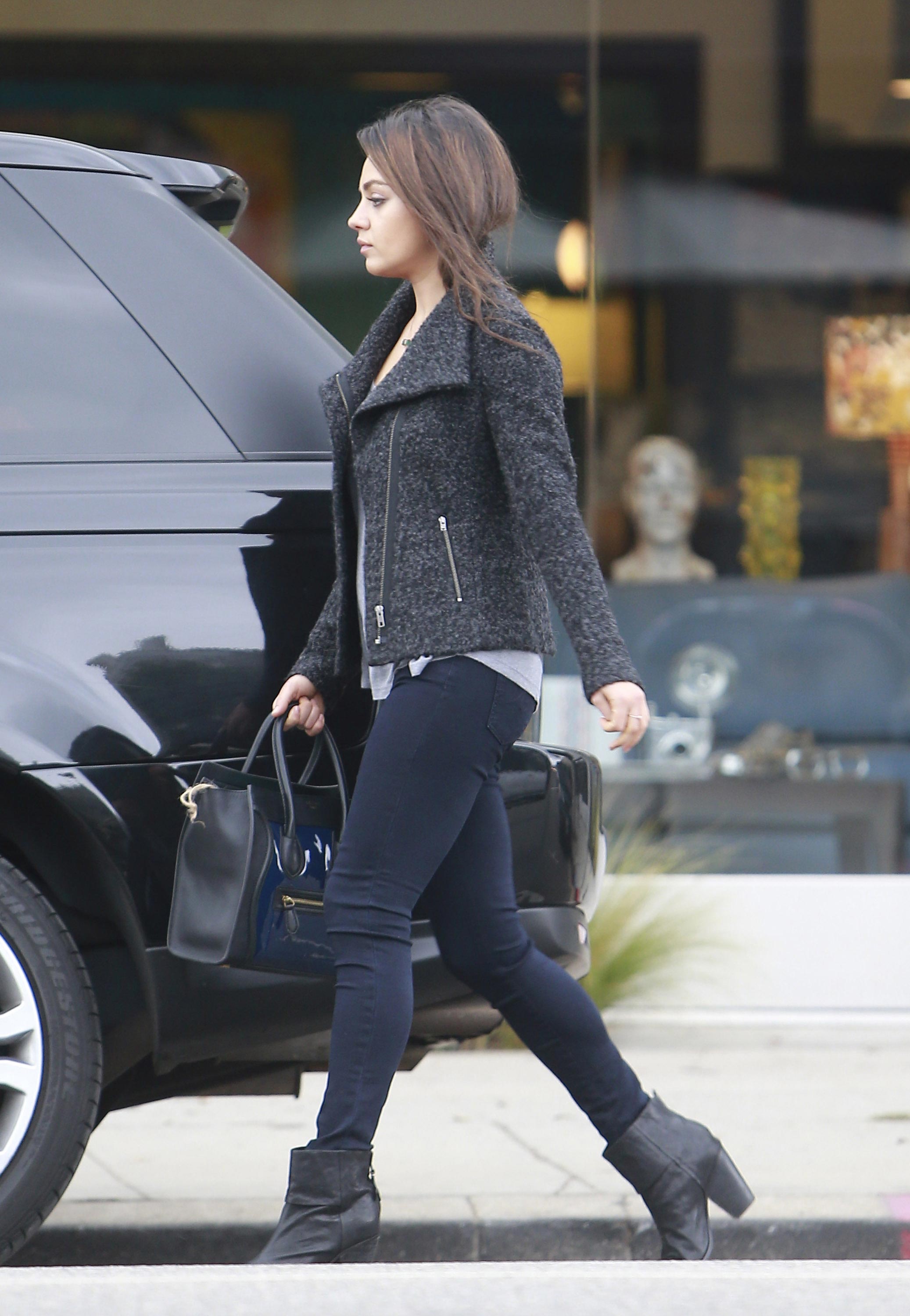 Mila Kunis Street Style - in Jeans at the supermarket in Los Angeles