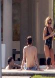Lindsay Lohan in a Swimsuit at a Pool in Miami - December 2013