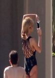 Lindsay Lohan in a Swimsuit at a Pool in Miami - December 2013