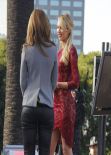 Maria Menounos and Candice Swanepoel - on the Set of EXTRA in Universal City - Dec. 2013