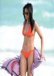Padma Lakshmi in an Orange Bikini at Her Hotel Pool in Miami - December 2013