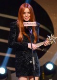 Lindsay Lohan leggy at Sohu Fashion Awards