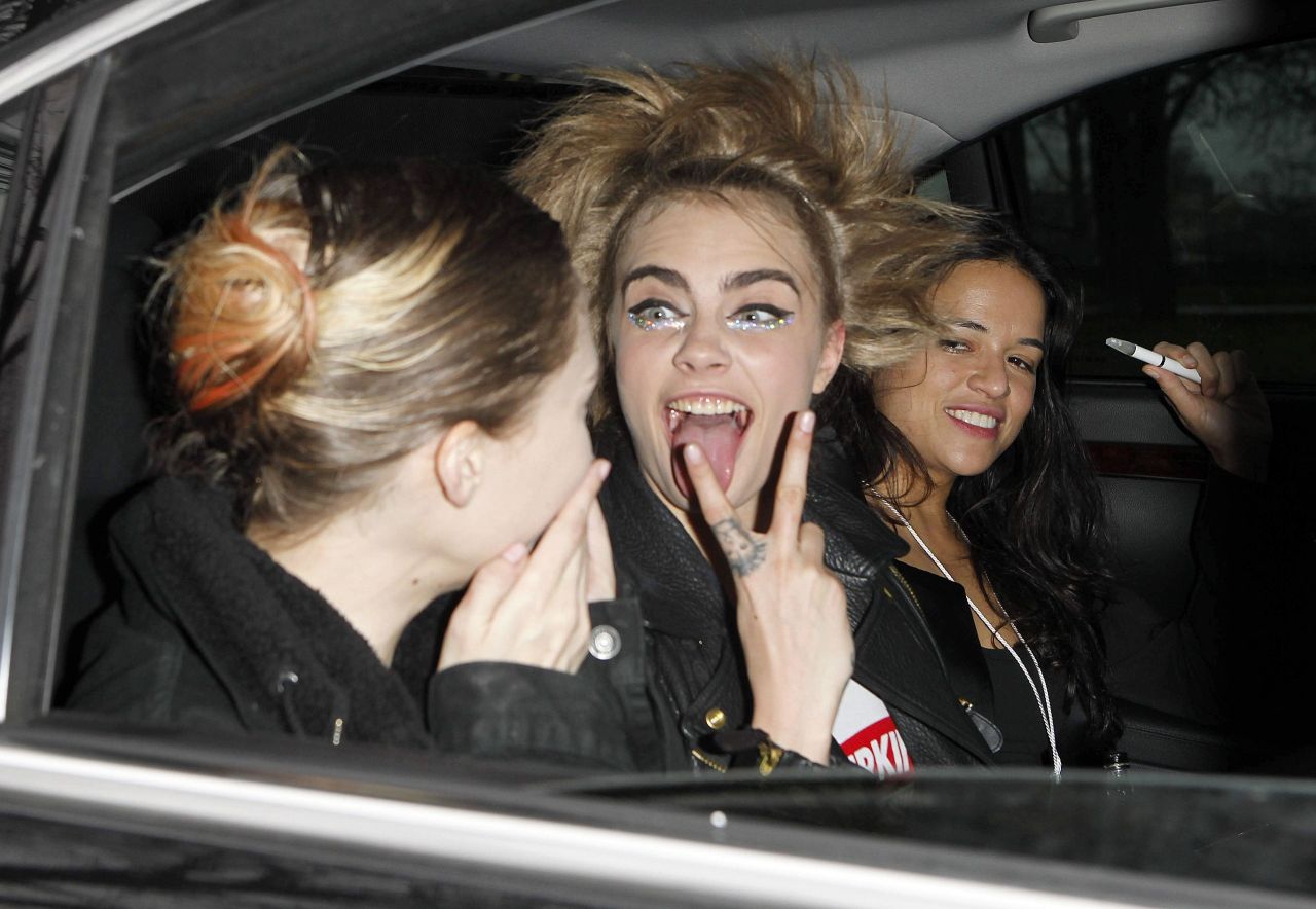 Cara Delevingne and Michelle Rodriguez Leaving Chanel Fashion Show in Paris, January 2014