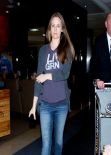 Alicia Silverstone in Jeans at LAX Airport - February 2014