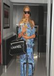 Paris Hilton in a Eye-Catching Outfit - At LAX airport in Los Angeles February 2014