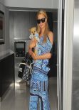 Paris Hilton in a Eye-Catching Outfit - At LAX airport in Los Angeles February 2014