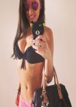 Claudia Romani in a Bikini - Facebook, March 2014