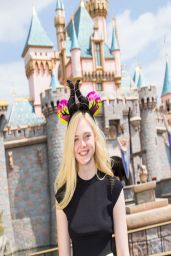 Elle Fanning Posing in a Black Top at Disneyland in Anaheim - April 2014