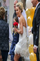 Kate Gosselin Wearing Short Wedding Dress and High Heels to promote 