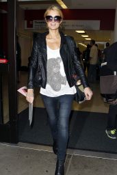 Paris Hilton in Tight Jeans at LAX Airport in Los Angeles - May 2014