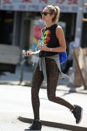 Candice Swanepoel in T-Shirt and Leopard Leggings in Soho, New York City - May 2014