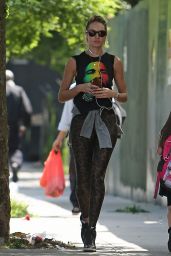 Candice Swanepoel in T-Shirt and Leopard Leggings in Soho, New York City - May 2014