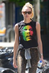 Candice Swanepoel in T-Shirt and Leopard Leggings in Soho, New York ...