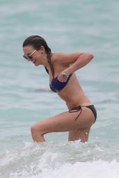 Katie Cassidy Wearing a Bikini at a beach in Miami - May 2014