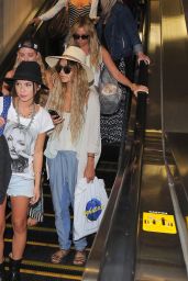 Vanessa Hudgens & Ashley Tisdale at LAX Airport - May 2014