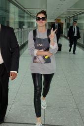 Barbara Palvin Looks Cheerful at Londons Heathrow Airport - June 2014