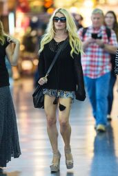 Jessica Simpson in Mini Skirt at LAX & JFK Airport - June 2014
