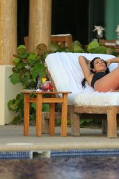 Kim Kardashian in Black Bikini - Enjoys the Pool in Mexico - June 2014