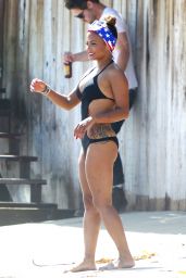 Christina Milian Wearing a Swimsuit at Paris Hilton