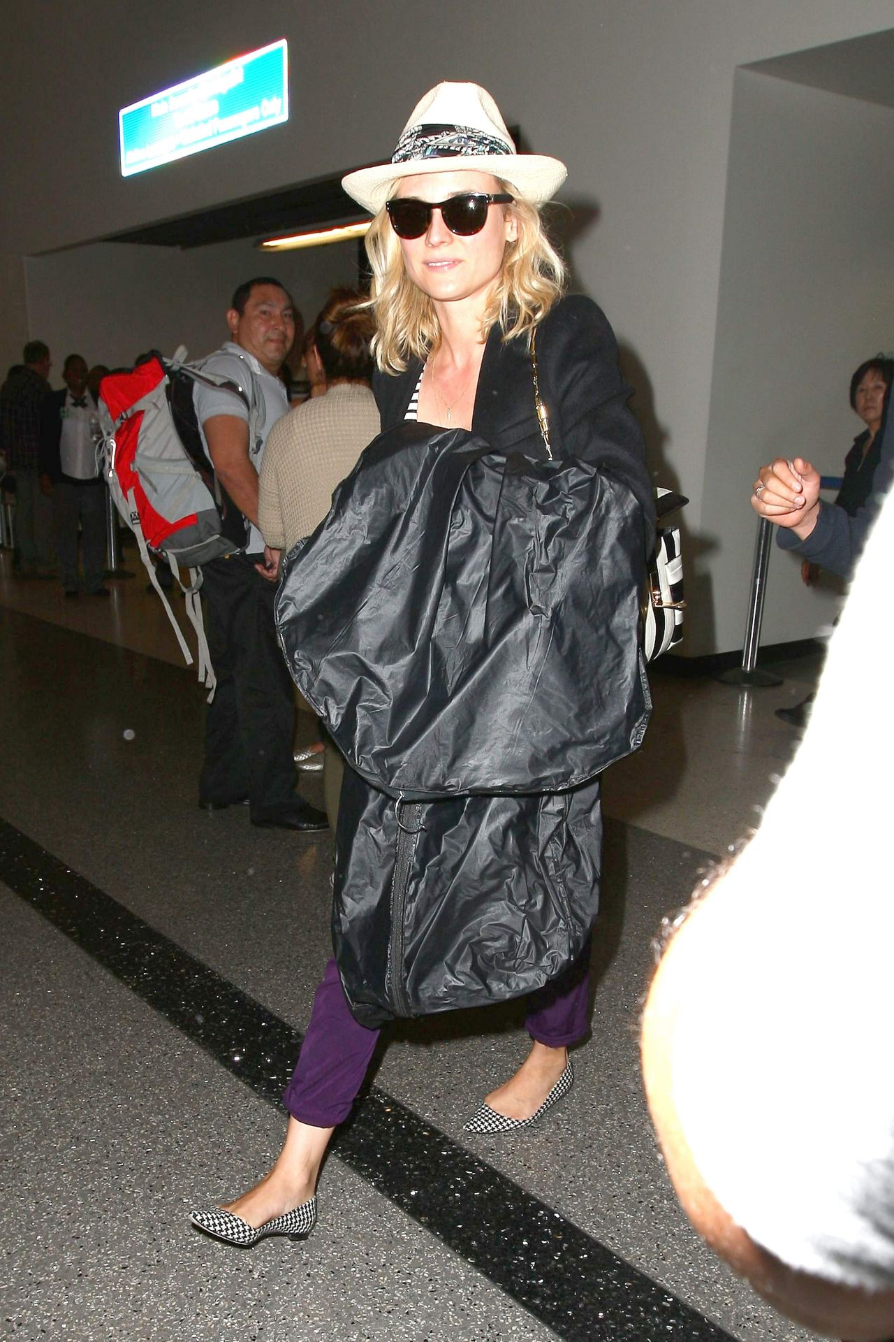 Diane Kruger Arriving on a Flight at LAX in Los Angeles - June 2014