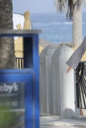Eva Longoria Shows off her Enviably Toned Legs - Marbella, Spain July 2014