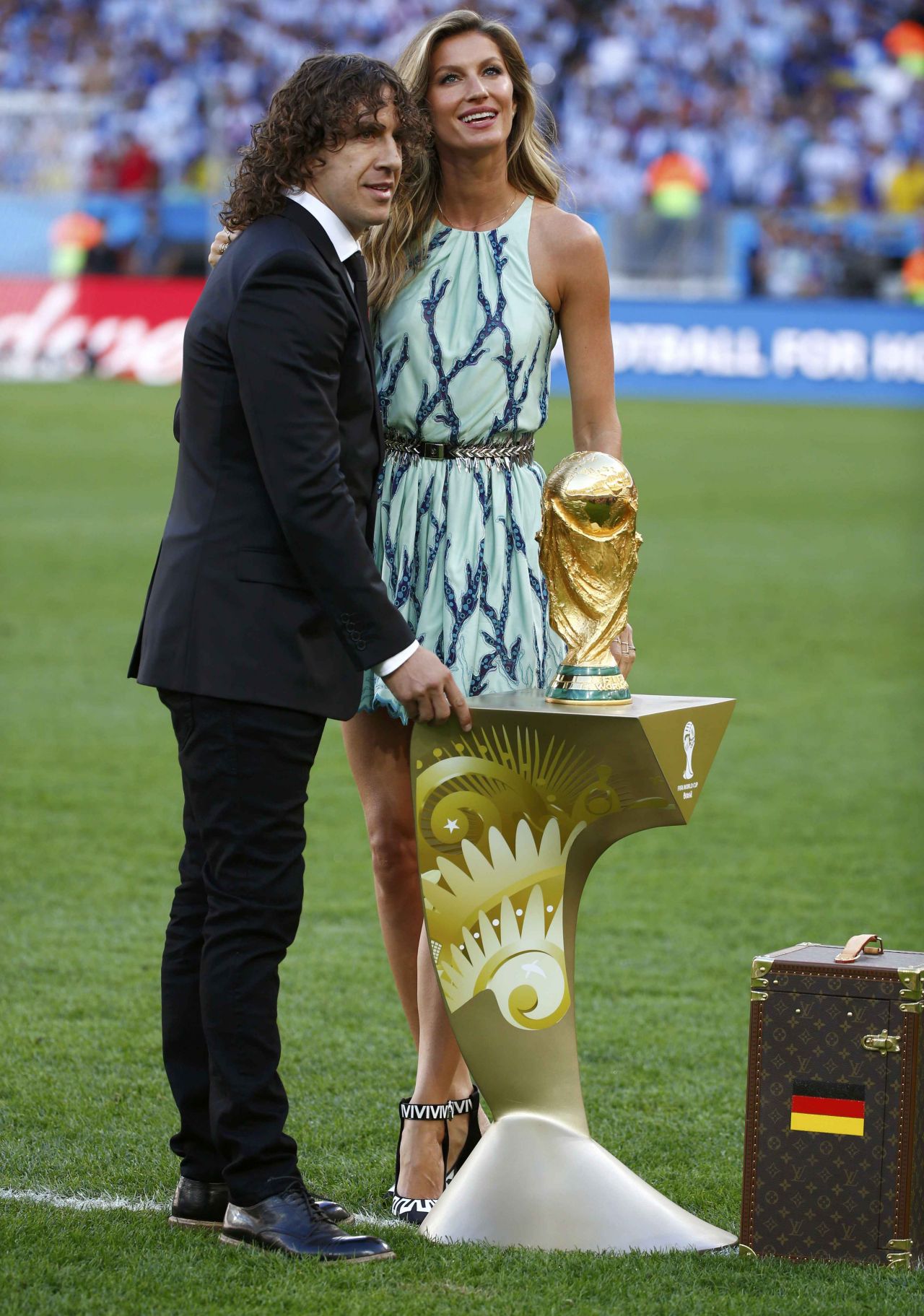 Sexy Gisele Bundchen unveils FIFA World Cup 2014 trophy with