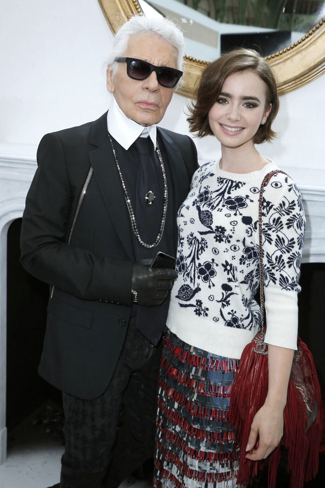 Lily Collins arriving to the Chanel Haute-Couture Fall-Winter 2014-2015  fashion show held at the Grand Palais, in Paris, France, on July 8, 2014.  Photo by Robin Psaila/ABACAPRESS.COM Stock Photo - Alamy