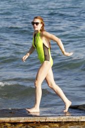 Lindsay Lohan in a Swimsuit at a Beach in Ibiza - July 2014