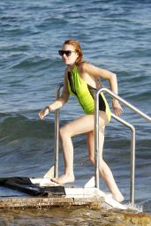 Lindsay Lohan in a Swimsuit at a Beach in Ibiza - July 2014
