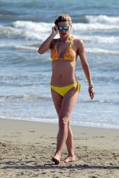 Michelle Hunziker in Yellow Bikini - on the Beach in Forte dei Marmi - July 2014
