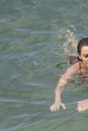 Penelope Cruz in a Red Swimsuit at a Beach in Spain - June 2014