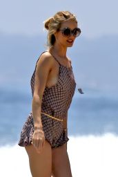 Rosie Huntington-Whiteley in Short Shorts Walking on the Beach in Malibu - July 2014