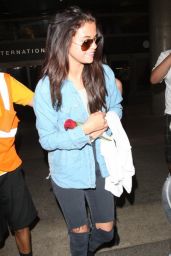Selena Gomez & Cara Delevingne at LAX Airport in LA - July 2014