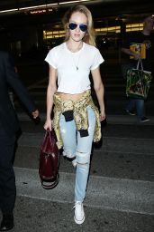 Candice Swanepoel in Ripped Jeans at LAX Airport - September 2014