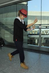 Cara Delevingne at Heathrow Airport in London - September 2014