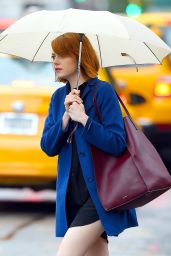 Emma Stone With Umbrella - Out in New York City - Septemeber 2014