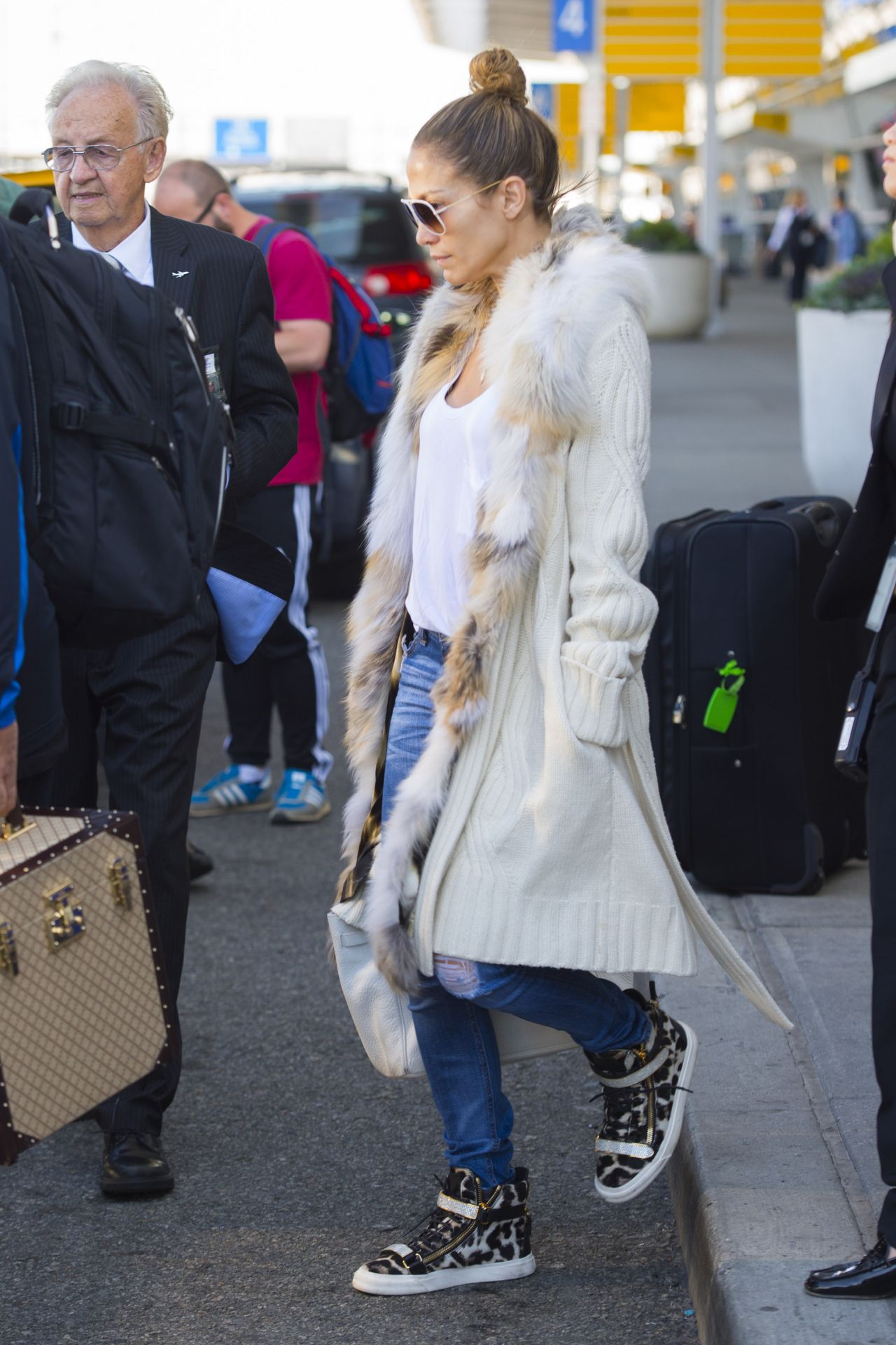 Jennifer Lopez Street Style - JFK Airport in NYC - September 2014 ...