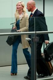 Kirsten Dunst - Catching a flight at London Heathrow Airport - August 2014