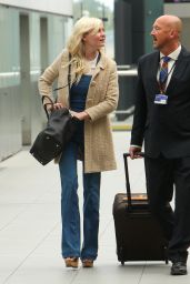Kirsten Dunst - Catching a flight at London Heathrow Airport - August 2014