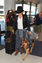 Nikki Reed With Her Dogat at LAX Airport in Los Angeles - September 2014