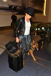 Nikki Reed With Her Dogat at LAX Airport in Los Angeles - September 2014