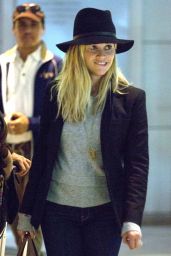 Reese Witherspoon in Jeans and Heels at JFK Airport in New York City, Sept. 2014