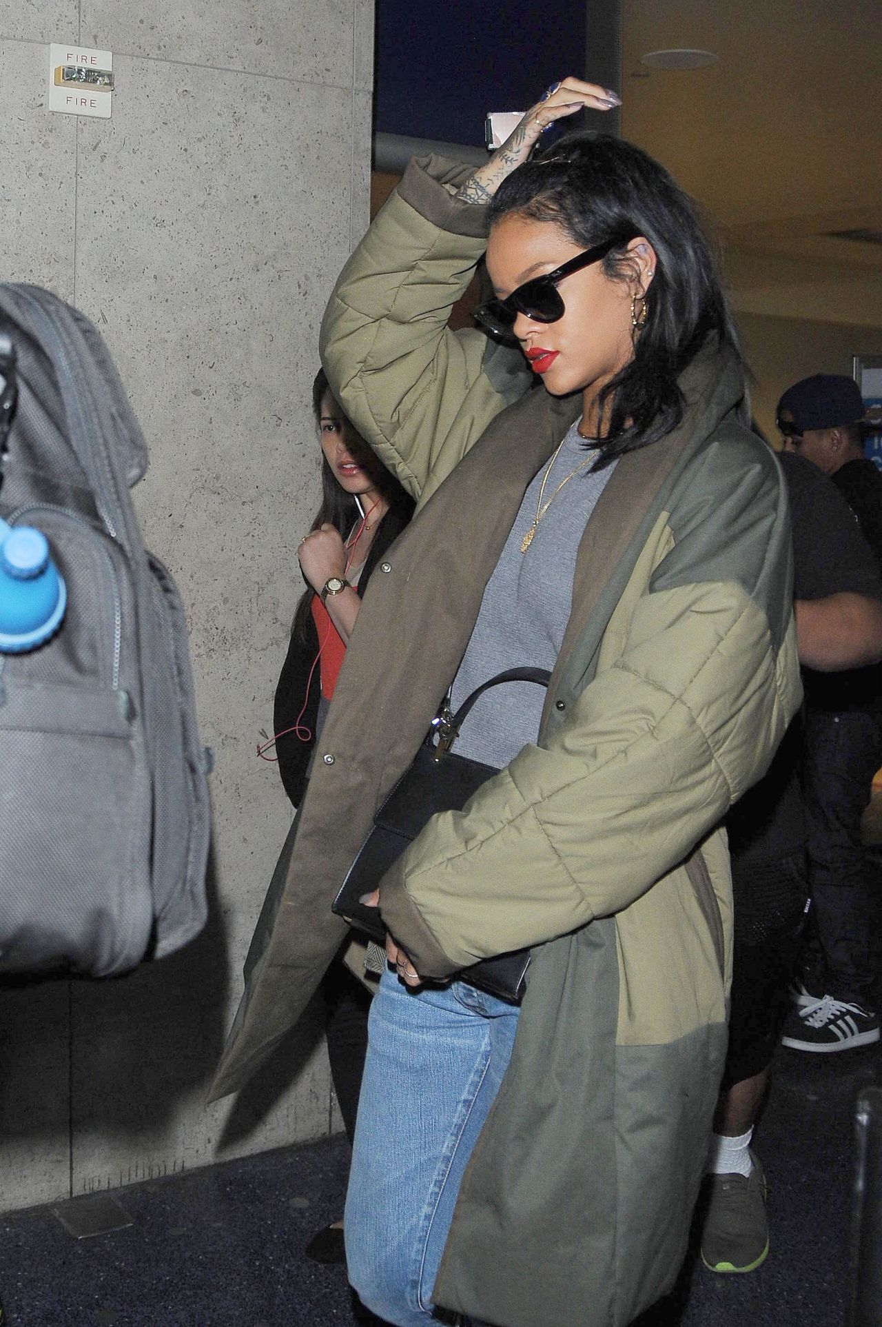 Rihanna in Jeans - Arriving at LAX Airport in Los Angeles, Sept. 2014 ...