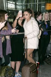 Ariana Grande Shows Legs at Heathrow Airport in London - October 2014