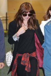 Dakota Johnson Arriving at the Airport in Vancouver - October 2014