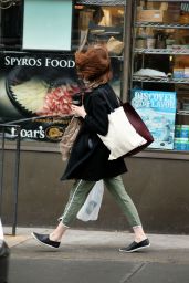 Emma Stone - Shopping on a Windy Day in New York City - October 2014