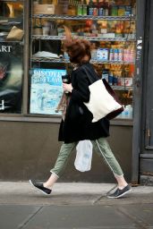 Emma Stone - Shopping on a Windy Day in New York City - October 2014