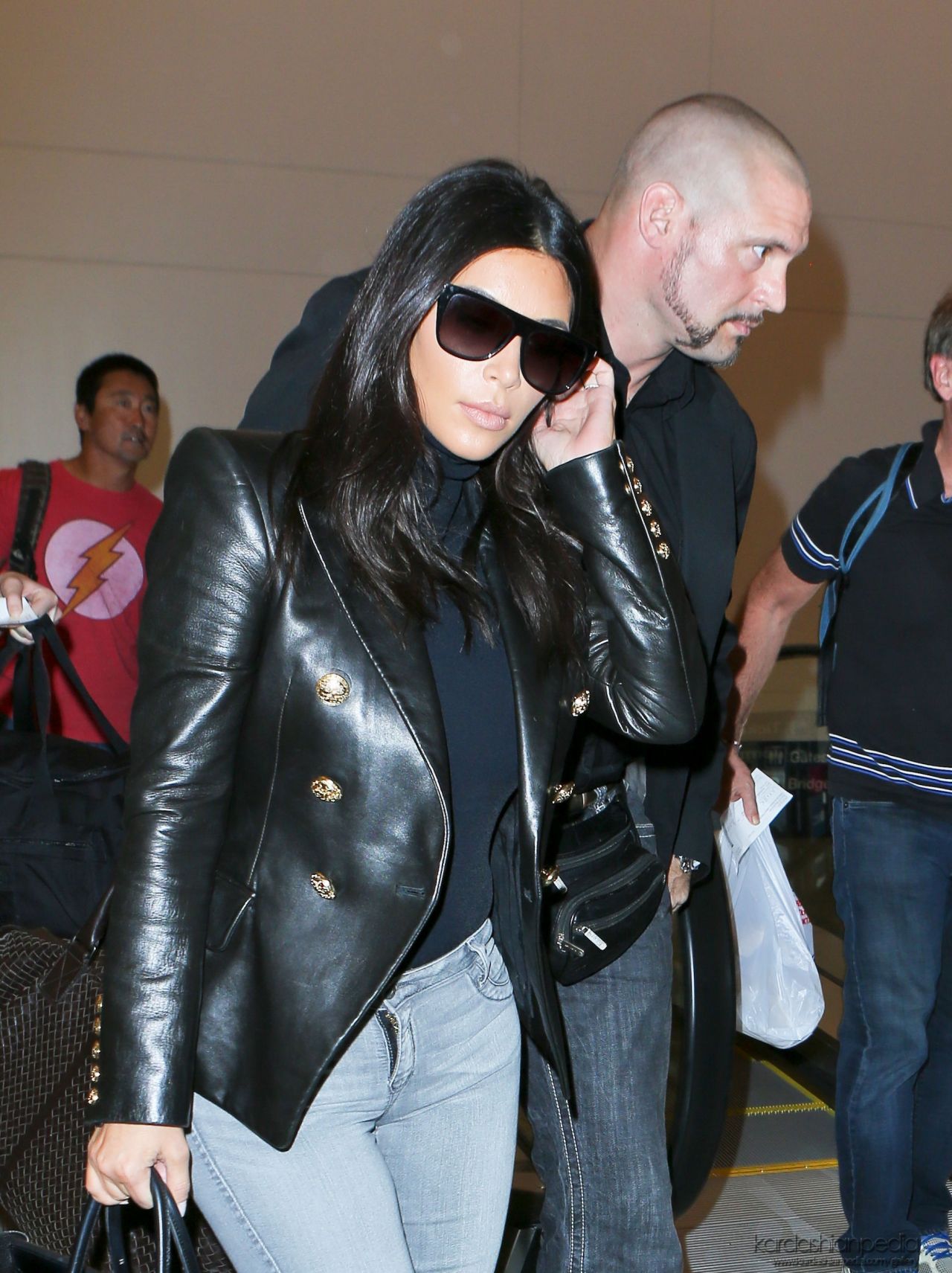Kim Kardashian in Jeans at LAX Airport, October 2014 • CelebMafia