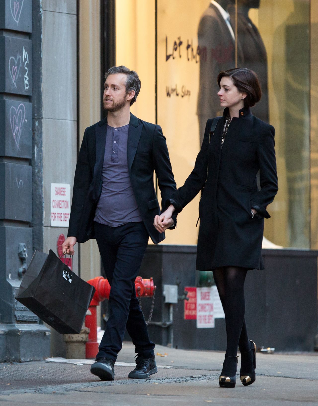 Anne Hathaway With Her Husband Adam Shulman - Leaving Their Hotel in ...