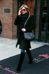 Jennifer Aniston in Coat - Leaving Her Hotel in New York City - November 2014